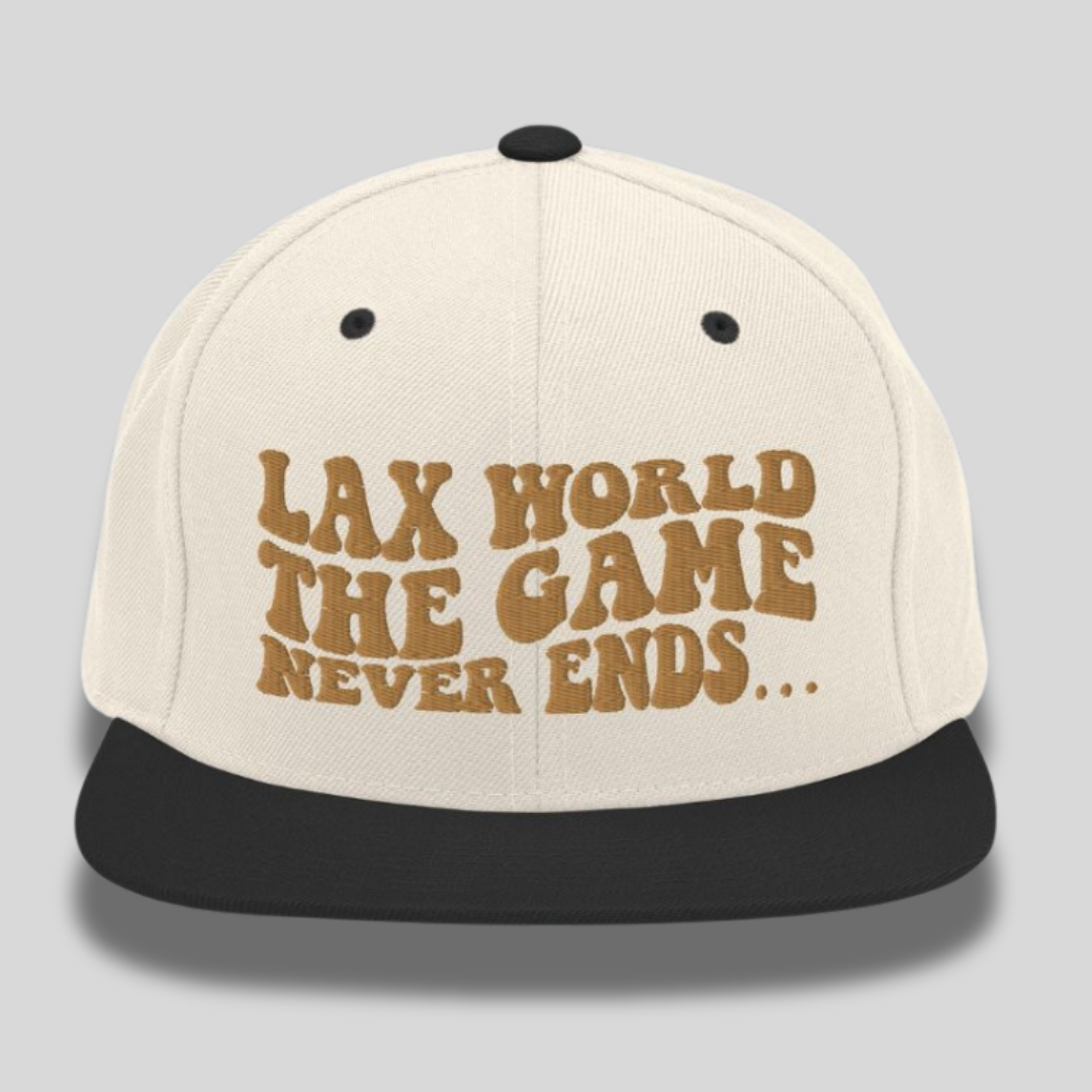 Premium “The Game Never Ends…” Snapback Lacrosse Hat | Black and Beige | Man - Off Field