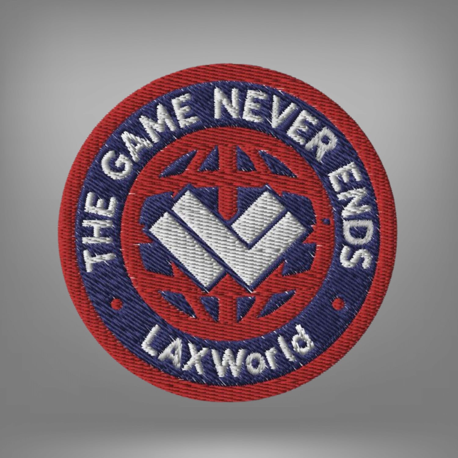 “The Game Never Ends…” Embroidered Lacrosse Patch | Red/Navy | Man - Off Field